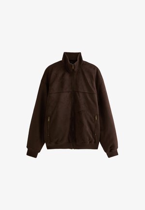 Brown fleece jacket with a high collar, front zipper, and ribbed cuffs. Features two zippered side pockets and a smooth texture.