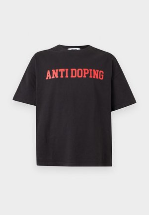 Black short-sleeve T-shirt with red "ANTI DOPING" text printed across the chest, displayed on a plain light background.
