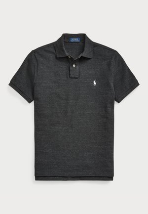 Dark gray polo shirt made of textured fabric, featuring a collar, three-button placket, and a small white logo on the chest.