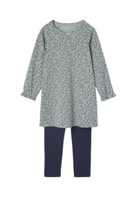 Floral tunika Kleid in Hellblau mit langen Ärmeln und Rüschenschäften, kombiniert mit dunkelblauen Leggings. Aus Baumwolle, lockere Passform.