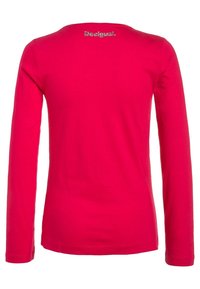 Långärmad rosa T-shirt i bomull, med rund hals och texten "Desigual" i glänsande material på övre ryggen.