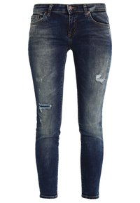 Úzké džíny v tmavě modrém denimu, s opotřebením na kolenou a jemn ým vyblednutím, s klasickým designem pěti kapes.