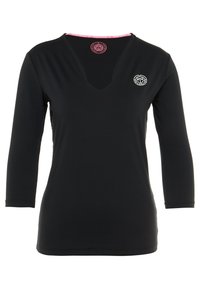 Svart långärmad topp med V-ringning och rosa kant vid halsen. Har en liten vit logotyp på vänster bröst. Tillverkad av elastiskt material.