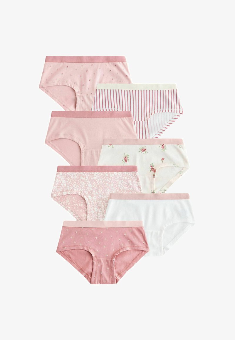 Sept culottes en coton pour femmes dans différents motifs pastel rose et blanc, incluant rayures, fleurs et couleurs unies, disposées verticalement.