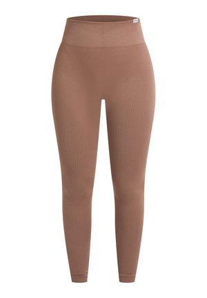Gerippte Leggings in einem gedämpften Braunton, mit hohem Bund, dehnbarem Stoff und einer figurbetonten Silhouette. Keine sichtbaren Nähte oder Muster.