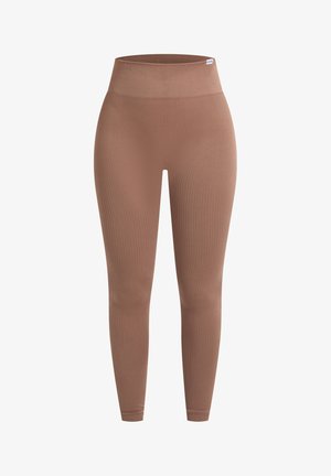 Geribbelde leggings in een gedempte bruine kleur, met een hoge tailleband, rekbare stof en een aansluitende pasvorm. Geen zichtbare naden of patronen.