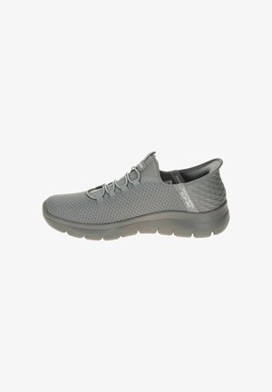 Gray athletic shoe with a mesh upper, elastic laces, textured heel counter, and a flexible rubber sole. Lightweight design for comfort.
