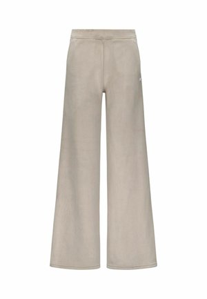 Pantaloni da tuta larghi color beige chiaro con finitura testurizzata, dotati di una vita alta e una sottile etichetta sul retro.