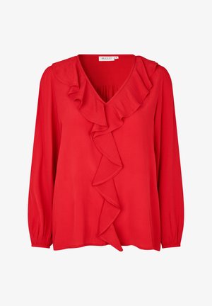 Czerwona bluzka z długim rękawem i dekoltem w kształcie litery V, z falbaną z przodu. Wykonana z lekkiego materiału o gładkiej fakturze, z marszczonymi mankietami.