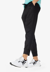 Spyder Pantalones deportivos - black