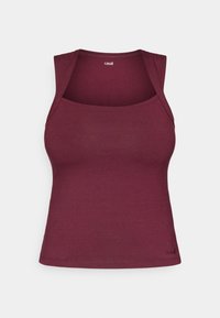 Μπορντώ αμάνικο τοπ φτιαγμένο από ελαστικό ύφασμα, με βαθύ λαιμόκοψο και χωρίς μανίκια. Μικρό λογότυπο στην κάτω αριστερή γωνία.