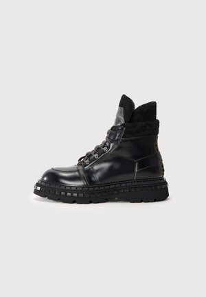 Botines con cordones - black
