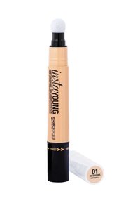 Stick correttore a rotazione con una morbida punta applicatrice rotonda. Il corpo è beige con accenti e testi neri, etichettato "instayoung" e "01 Soft Vanilla."