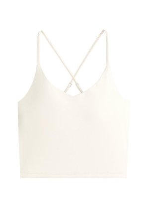 Cremefarbene, kurz geschnittene Camisole mit dünnen, gekreuzten, verstellbaren Schulterträgern und V-Ausschnitt.