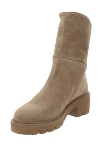 Stivale alla caviglia in suede beige con punta arrotondata e tacco spesso, con una texture liscia e morbida e un design con asta ripiegata.
