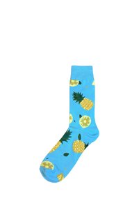 Blå bomuldsstrømpe med gule ananas- og ananasskive-mønstre, med grønne detaljer. Standard længde og glat tekstur.