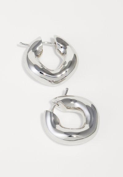 Pair of shiny silver chunky hoop earrings with a rounded square shape and hinged clasps on a plain white background.
