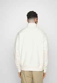 Carhartt WIP HALF ZIP AMERICAN SCRIPT - Collegepaita - wax