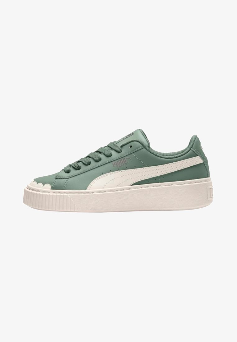 Green leather sneaker with a white midsole, rounded toe, and textured rubber outsole. It features a lace-up design and side logo detail.