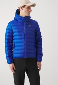 Lacoste Outdoorová bunda - bleu