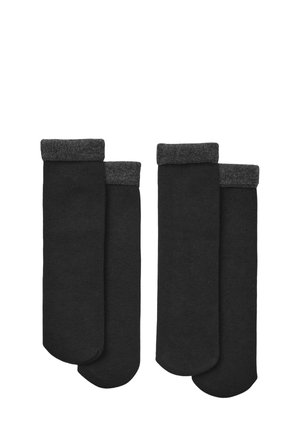 Quattro paia di calze fino al ginocchio di colore nero solido, con un bordo in grigio scuro a contrasto. Realizzate in un tessuto morbido e elastico.