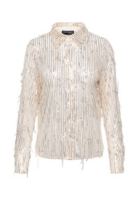 Crème overhemdd met verticale metallic franjes, een kraag en lange mouwen. Zachte textuur met glanzende accenten overal.