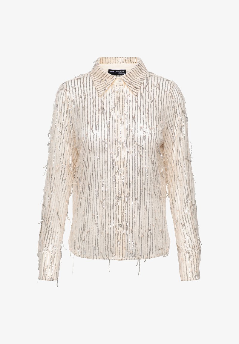 Crème overhemdd met verticale metallic franjes, een kraag en lange mouwen. Zachte textuur met glanzende accenten overal.