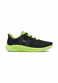 Baskets de sport noires avec des accents vert fluo, tige en mesh, semelle texturée et lacets noirs. Présente un logo réfléchissant sur le côté.