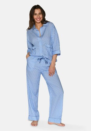 Light blue pajama set featuring a button-up top with rolled sleeves and drawstring pants, both adorned with a small diamond pattern.