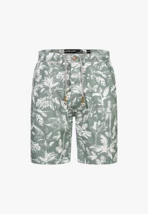 Gröna shorts i tyg med ett tropiskt vitt lövmönster, med dragsko i midjan och en knappstängning upptill.