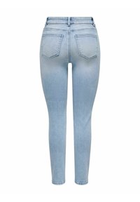 Jean skinny bleu clair à taille haute, avec un design à cinq poches et une texture lisse. La vue arrière présente deux poches cousues.
