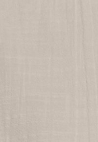Un tissu doux de couleur beige clair avec une texture tissée subtile et de fines lignes verticales et horizontales.