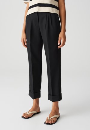 MALLON GERADER - Trousers - black