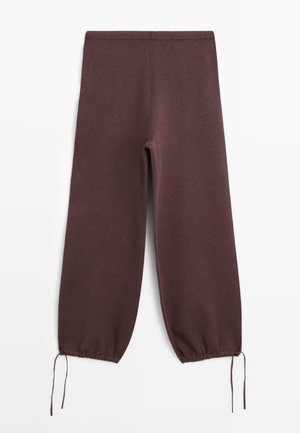 Pantaloni bordeaux realizzati in morbido tessuto, con un design a gamba affusolata, polsini elastici e lacci regolabili alle caviglie.