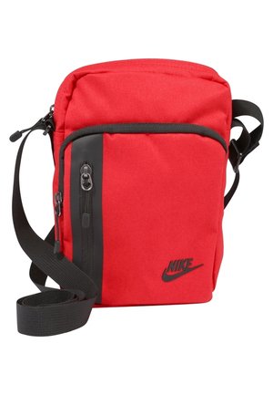 Sac d'épaule rouge Nike avec poche zippée noire et sangle noire réglable.