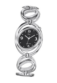 Montre-bracelet en argent avec un cadran rond noir, de grands index horaires en argent et des maillons ovales flexibles reliant le bracelet.
