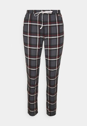 Black, grey, and white plaid pants with a drawstring waist and ankle-length fit, featuring a soft, lightweight fabric texture.