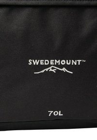 Black travel bag with a 70L capacity. Features a textured fabric and white logo “SWEDEMOUNT” above a mountain graphic. Simple design.