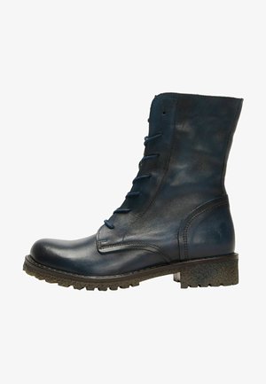 Marineblauwe leren veterschoenen met enkelhoogte, een ronde neus, een textuur op de zool en een gladde afwerking. Voorzien van metalen oogjes en een verstevigd achterpaneel.