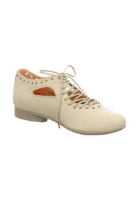 Beige leather shoe with open sides, closed toe, and rounded heel. Features a crisscross lace-up design with circular cutouts along the edge.