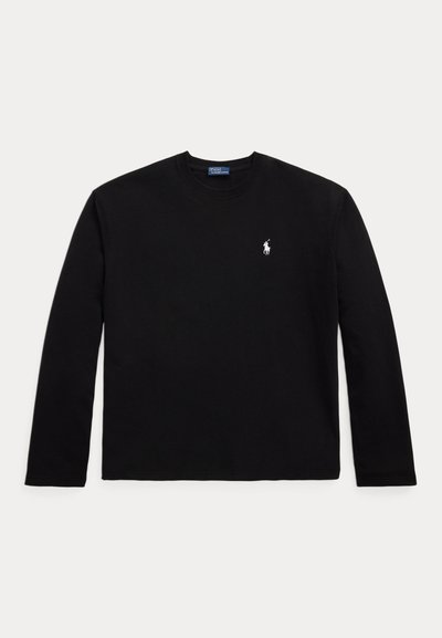 Musta pitkähihainen t-paita, joka on valmistettu puuvillasta ja jossa on pyöreä kaula-aukko sekä pieni valkoinen polo-logo vasemmassa rinnassa. Sujuva pinta.