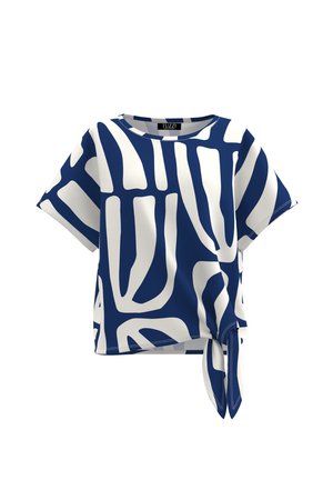 Blue and white short-sleeve blouse with abstract geometric pattern and side tie detail at the hem.