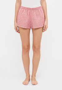 Røde og hvite rutete shorts med elastisk midje, med en avslappet passform og myk stoff. Ingen tilleggselementer eller forskjønnelse.
