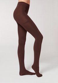 Brune, uigennemsigtige leggings med en glat overflade, sømløst design og høj talje for en tætsiddende pasform, der strækker sig fra talje til tå.