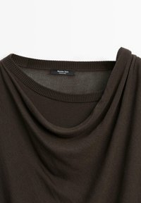 Brown knitted top with a scoop neckline, featuring draped fabric. Label "Massimo Dutti" visible near the collar. Soft texture, casual design.