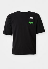Black cotton T-shirt with short sleeves, featuring a pocket with a cat graphic and green "PUMA" text. Casual fit and smooth texture.