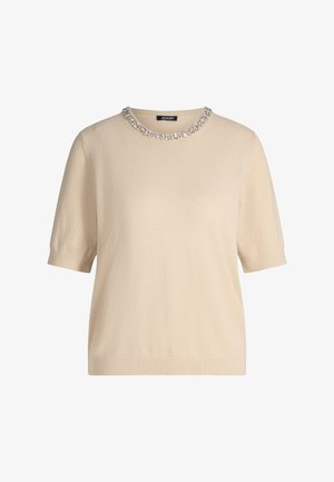 Maglione beige a maniche corte con scollo tondo impreziosito da un colletto decorativo con perline di cristallo. Morbida texture e orlo a coste.