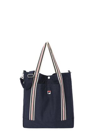 Sac fourre-tout bleu marine avec des anses rayées en blanc, rouge et noir, une poche avant, un bouton pression et une bandoulière réglable.