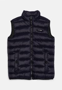 Navy blue, insulated vest with a high collar, front zip closure, and two side pockets; features a quilted, padded design and logo detail.