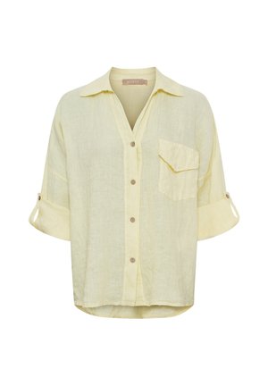 Lysegul hørskjorte med knapper, krave, forlommes med klap og opsmøgede ærmer fastgjort med knapper.